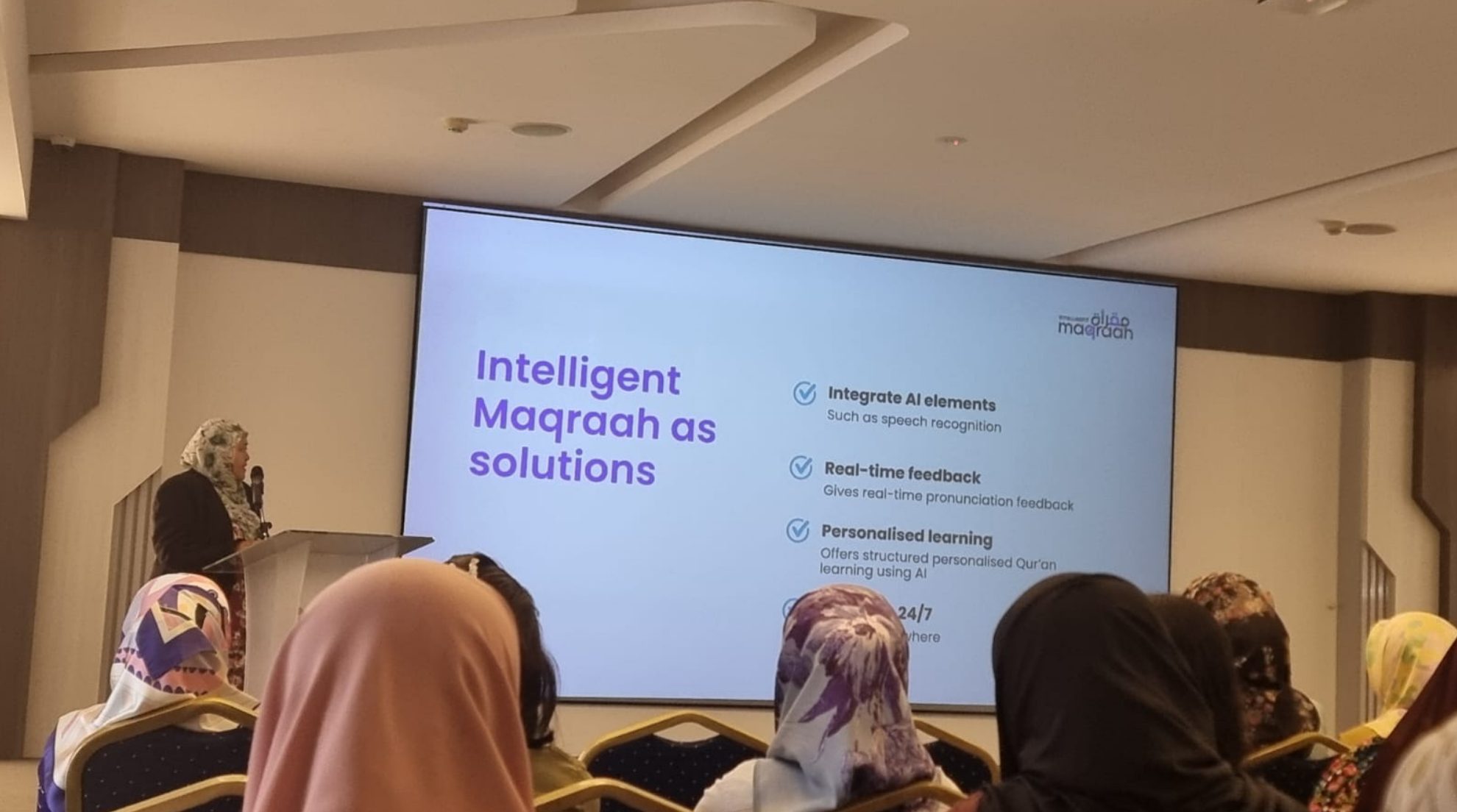 The founder presenting Intelligent Maqra'ah to an audience